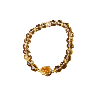 Elegantes Citrin Perlenarmband mit goldenem Kürbis-Anhänger und gelbem Herzstein