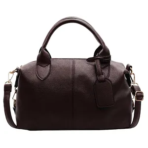 Deep wine red pebbled leather Boston handbag with detachable strap and top handles