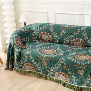 Bohemian green cotton sofa throw cover with elegant mandala pattern and fringe detail