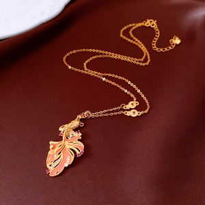 Detailed close-up of 24K gold plated koi fish pendant with colorful enamel and zircons