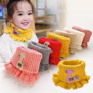 Cozy knitted children's scarf with giraffe pattern and handmade tag in multiple colors