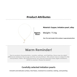 Detailed view of an elegant gold adjustable necklace with a white imitation pearl pendant