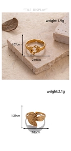 Detail display of gold leaf and oval adjustable rings with exact weight and dimensions