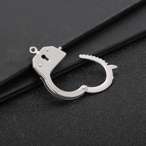 Detailed view of silver stainless steel handcuff shaped jewelry clasp for necklaces