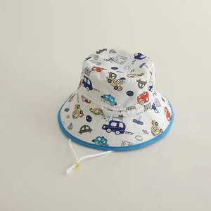 Detail showing cartoon car prints and adjustable blue drawstring on children's sun hat