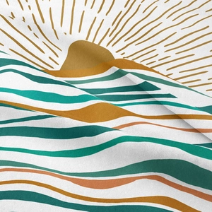 Macro detail of bohemian tapestry fabric showing woven texture and abstract sun print