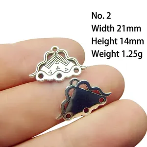 Macro shot of 21x14mm Tibetan silver hollow cloud pendant for DIY jewelry making
