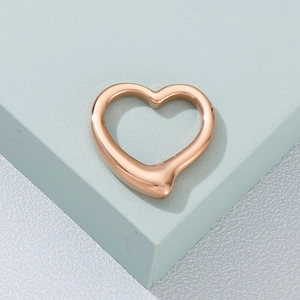 Minimalist hollow heart pendant in rose gold finish made of durable stainless steel