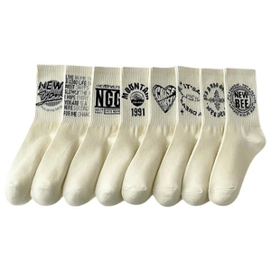 Pack of seven white cotton crew socks with unique black text and graphic prints