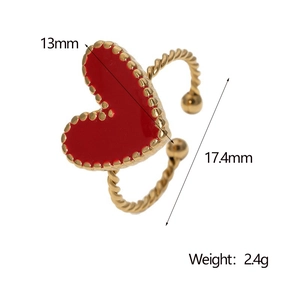 Detail view of golden twisted ring with red heart enamel showing size 13mm and 17.4mm