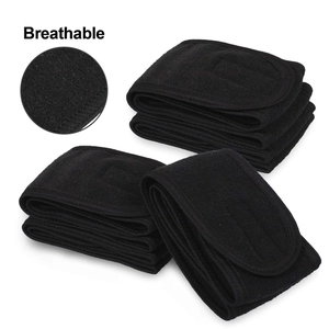Close-up of breathable black terry cloth headbands showing fabric texture and detail