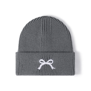 Grey rib-knit beanie for women with white bow embroidery and thick folded cuff design