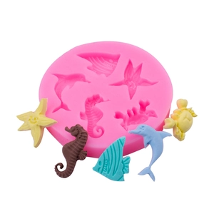 Pink silicone mold featuring 6 ocean animal shapes like seahorse and starfish for DIY crafts