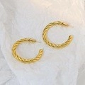 18K gold-plated twisted C-shape titanium steel hoop earrings with spiral texture detail