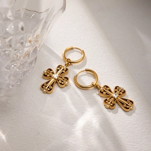 Vintage gold cross hoop earrings with engraved metal texture and square zircon stone