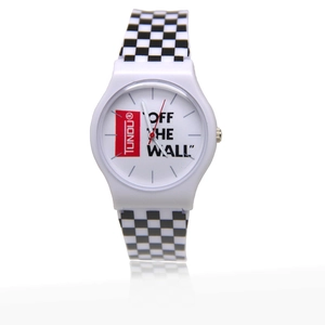White minimalist watch with black and white checkered strap shown on a clean background