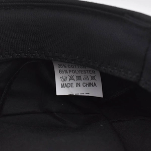 Close-up of internal wash care label showing 35% cotton and 65% polyester composition