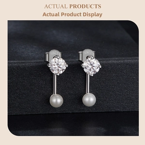 Detail showing the S925 sterling silver hallmark engraving on pearl and zircon earrings
