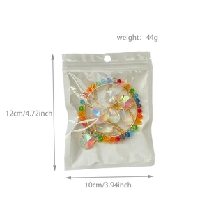Detailed view of K9 crystal suncatcher dimensions 12cm by 10cm weighing 44g in packaging