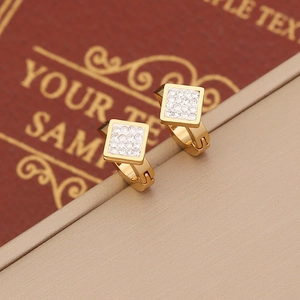 Detail view of gold-plated square hoop earrings with micro-pave cubic zirconia crystals