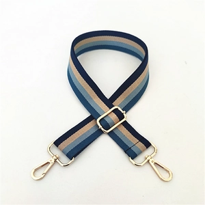 Adjustable blue and beige striped woven shoulder strap for handbags with gold metal buckles