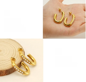 Detail of 18K gold plated hoop earrings with small white pearls and polished finish