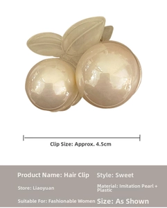 Detail view showing 4.5cm cherry-shaped hair claw made of pearls and sweet style resin