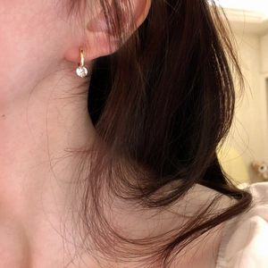 Minimalist S925 sterling silver gold hook earring with a round clear cubic zirconia