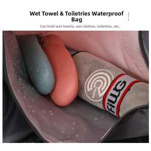 Detail view of the gray waterproof travel bag showing the pink inner lining for wet items