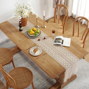 Beige crochet table runner with vintage phoenix tail pattern and decorative fringe