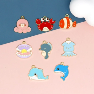Set of 8 colorful ocean animal enamel pendants including octopus dolphin and seashell