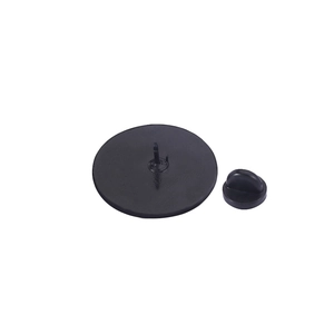 Detail view of the black metal brooch back with secure pin and rubber clutch fastener