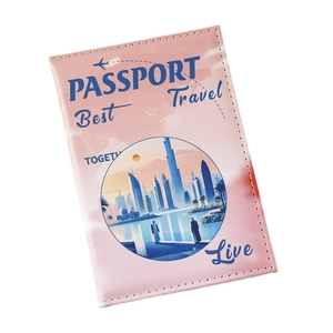 Pink faux leather passport holder with UV printed city skyline and travel illustration
