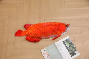 Detailed close-up of high-fidelity red dragon fish plush pillow shell with zipper detail