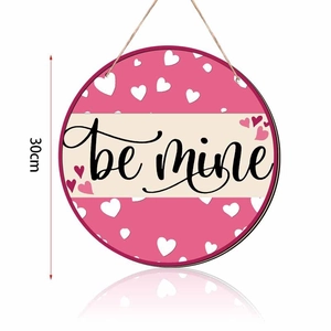 Detail of 30cm pink wooden heart door sign with black be mine calligraphy text