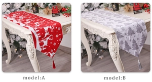 Close-up of Christmas jacquard knitted table runners with deer patterns and fringe tassels