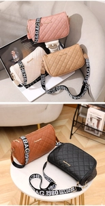 Close-up of quilted crossbody bags with wide straps in pink, beige, black, and white