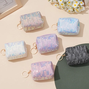 Mini monederos chic con lentejuelas en seis colores pastel y llaveros dorados elegantes