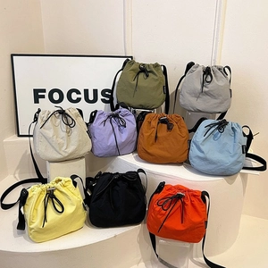 Women Nylon Drawstring Bucket Bag Casual Lightweight Crossbody Shoulder Bag Solid Color Trendy