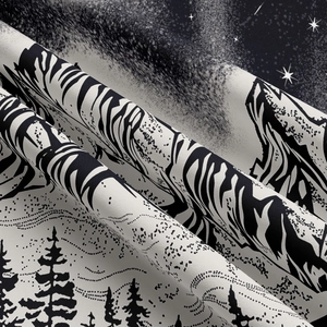 Detail of forest and starry night sky print on soft polyester mountain tapestry