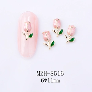 Detailed view of pink tulip nail charms with alloy edges and green leaves 6x11mm