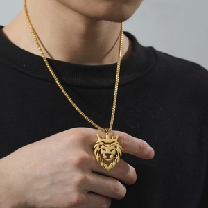 Men's titanium steel box chain necklace with a gold crown lion head pendant