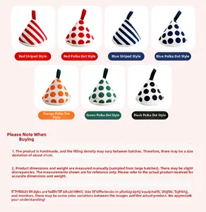 Detail of colorful cotton triangular pot lid handle covers with patterns and hanging loops