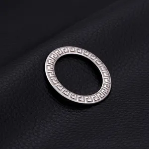 Titanium steel hollow pendant featuring classic Greek key pattern on black leather background