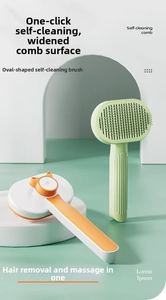 Detail of the self-cleaning button on the cat grooming brush for easy fur removal
