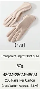 Detail view of beige thermal gloves showing plush texture and slim stitching design