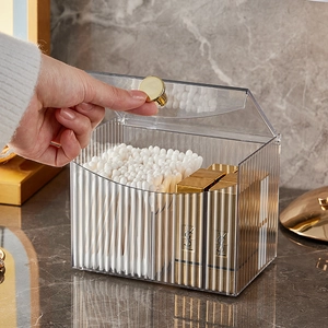 Transparent acrylic makeup organizer with striped texture and golden knob for vanity