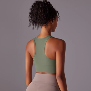 Rear view of olive green racerback sports bra showing ergonomic fit and back design