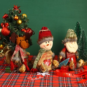 Three Christmas burlap drawstring gift bags with Santa, snowman and elk characters