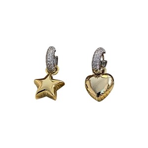 Asymmetric gold heart and star dangle earrings with sparkling zircon accents on silver base